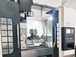 Five axis machining center