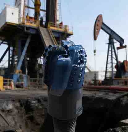 How have three-blade oil drill bits evolved in recent years?